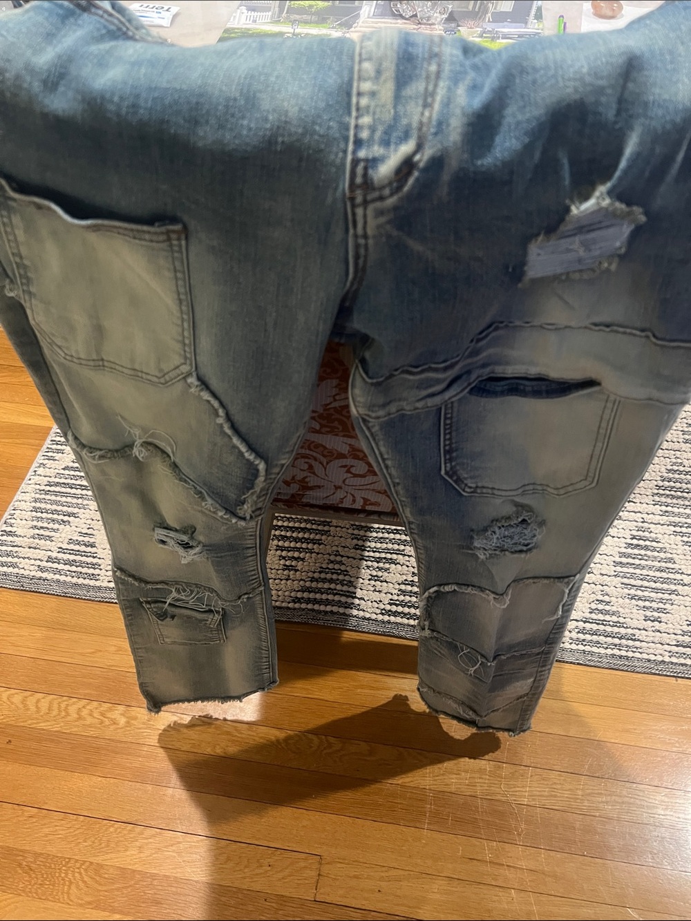 Men's Distressed Light Blue Jeans